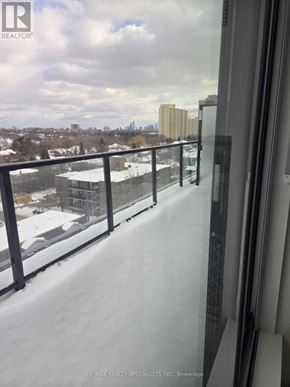Toronto (Yorkdale-Glen Park) condo for rent - A snowy cityscape is visible from a high vantage point.