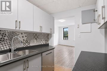 London East (East F) multi-family for rent - A kitchen with a sink and a counter top.