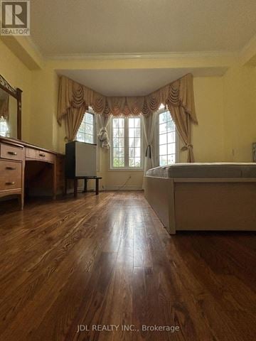 Toronto (Kensington-Chinatown) apartment for rent - A bedroom with a bed, dresser, and window.