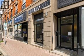Brantford apartment for rent - A street view of a building with the number 152 on it.