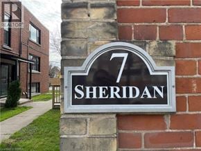 Brantford apartment for rent - A sign with the number 7 and the word Sheridan on it.