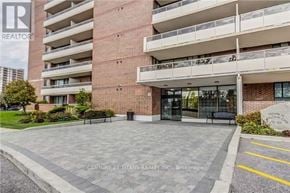 Toronto (Eglinton East) condo for rent - A building with a sign that says REALTOR in front of it.