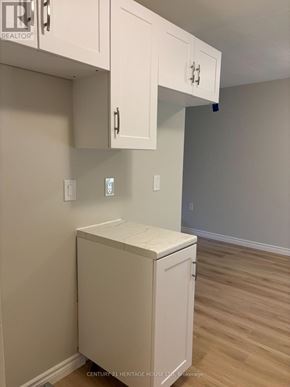 St. Thomas multi-family for rent - A white cabinet with a drawer is installed in a room.