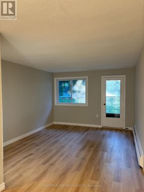 St. Thomas multi-family for rent - A room with a door and a window.