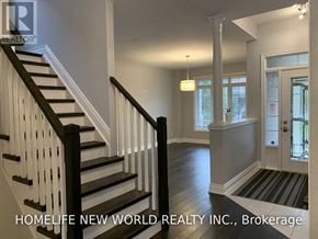 Hamilton (Winona Park) apartment for rent - A staircase with a black railing and white steps.