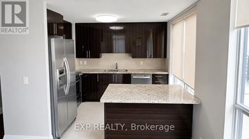 Toronto (York University Heights) condo for rent - A kitchen with EXP REALTY, Brokerage written on the wall.