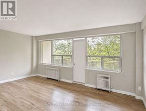 Toronto (Annex) condo for rent - A room with a window and a door.