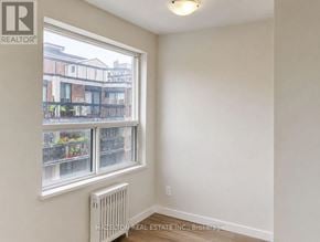 Toronto (Annex) condo for rent - A room with a window and a white wall.