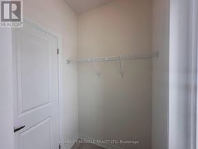 Brampton (Bram East) duplex for rent - A white door is on the left and a white wall is on the right.