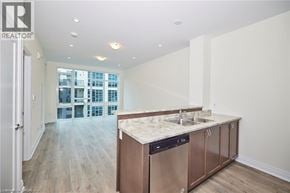 Grimsby condo for rent - A kitchen with a sink and a dishwasher.