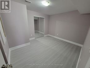 Brampton (Credit Valley) apartment for rent - A room with a grey carpet and a white ceiling.