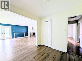 Windsor apartment for rent - A room with wooden floors and white walls.