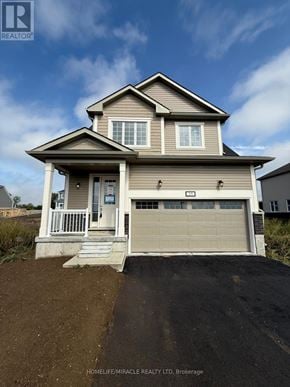 Loyalist (Bath) apartment for rent - A two-story house with a garage is for sale.