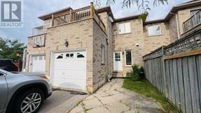 Richmond Hill (Rouge Woods) townhouse for rent - A two-story house with a garage is for sale.