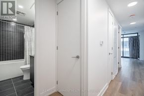 Hamilton (Beasley) condo for rent - A white door in a room with a tiled floor.