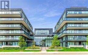 Burlington (Lasalle) condo for rent - A modern building with glass windows and balconies is surrounded by greenery.