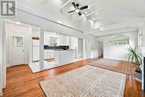 Toronto (Clairlea-Birchmount) apartment for rent - A spacious kitchen with white cabinets and a large island.