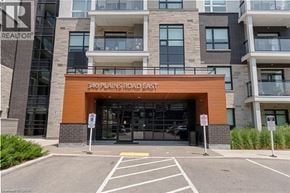 Burlington condo for rent - The entrance to a building with the sign 340 Plains Road East.
