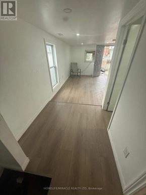 Woodstock (Woodstock - North) apartment for rent - A long hallway with wood floors and white walls.