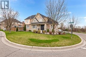 Ajax (Northeast Ajax) apartment for rent - A large house with a driveway in front of it.