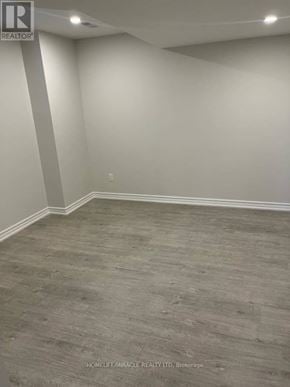 East Gwillimbury (Sharon) apartment for rent - A room with grey flooring and white walls.