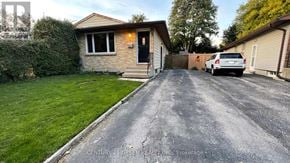 London North (North F) apartment for rent - A house with a driveway in front of it.