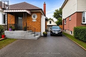 Oshawa (Lakeview) apartment for rent - A house with the number 875 on it.