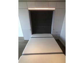 Surrey apartment for rent - A white bed with a black strip on it.