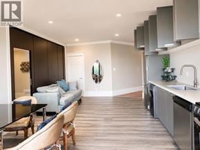 West Vancouver apartment for rent - A living room with a fireplace and a bicycle.