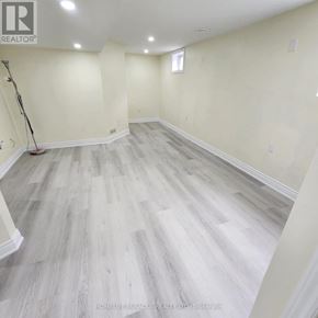 London East (East C) apartment for rent - A room with a brokerage logo on the wall.