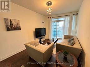 Markham (Thornhill) condo for rent - A living room with a flat screen TV and two couches.