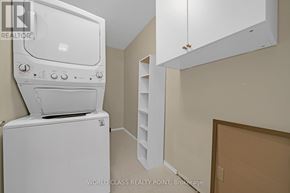 Richmond Hill (North Richvale) condo for rent - A white dishwasher and oven in a kitchen.