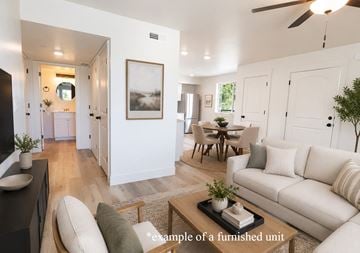 Payette apartment for rent - A living room with a white couch and a coffee table.