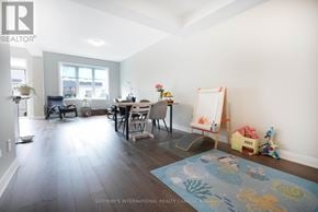 Ottawa townhouse for rent - A room with a blue rug and a whiteboard.
