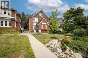 Waterloo apartment for rent - A residential area with houses and a well-maintained garden.