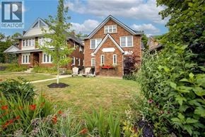 Waterloo apartment for rent - A house with a well-maintained garden in front.