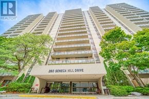 Toronto (Don Valley Village) condo for rent - The image shows a tall residential building with the name "260 SENECA HILL DRIVE" on the front.