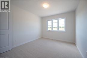 Kitchener apartment for rent - A room with a window and a door.
