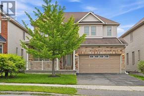 Ottawa apartment for rent - A house with a brown garage door is for sale.