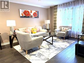 Richmond Hill (Mill Pond) apartment for rent - A living room with a large chair and a painting on the wall.
