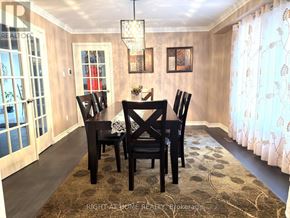 Richmond Hill (Mill Pond) apartment for rent - A dining room with a table and chairs.