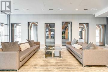 Toronto (Waterfront Communities) condo for rent - A modern living room with two couches and a coffee table.