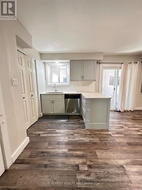 London South (South Y) apartment for rent - A kitchen with wooden floors and white walls.