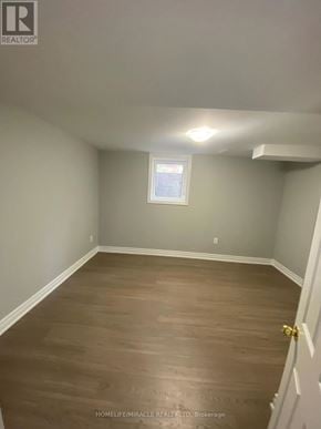 Brampton (Brampton South) apartment for rent - A room with wooden flooring and a window.