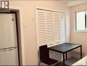 Vancouver apartment for rent - A small dining room with a table and chairs.