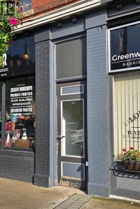 Milton (Om Old Milton) apartment for rent - A storefront with a sign that says "Greenway Barristers".