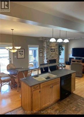 Clarington (Bowmanville) apartment for rent - A kitchen with a stone pillar and a countertop with a sink.