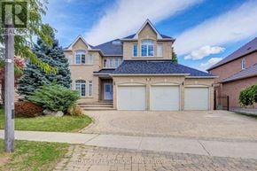 Markham (Cachet) apartment for rent - A large house with a driveway in front of it.