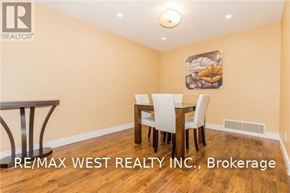 Brampton (Central Park) apartment for rent - A dining room with a table and chairs.