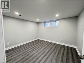 Hamilton apartment for rent - A room with wooden flooring and a window.